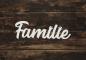 Preview: Schriftzug Familie mit Pfoten aus Holz in weiß